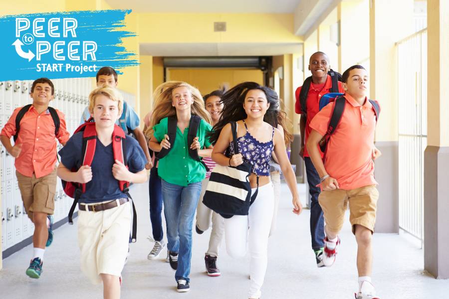 Students happy walking down the hall, P2P logo in the top left corner